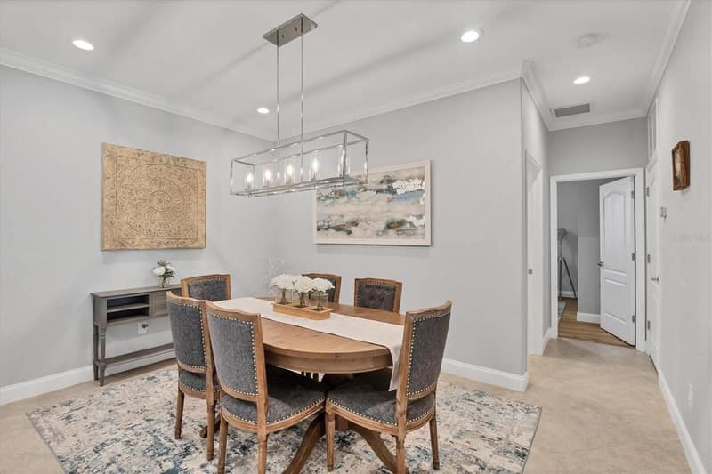 Dining table with upholstered chairs
