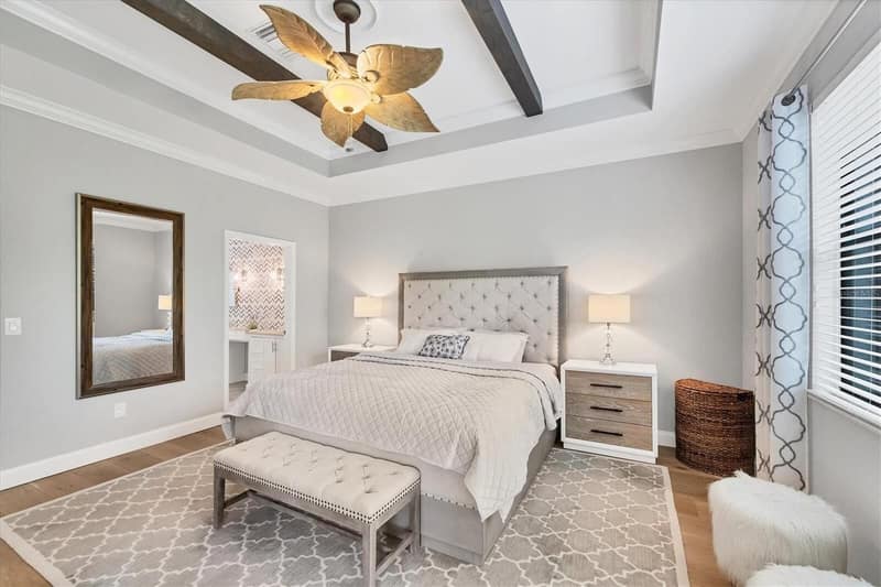 Bedroom with bedside tables and a bench