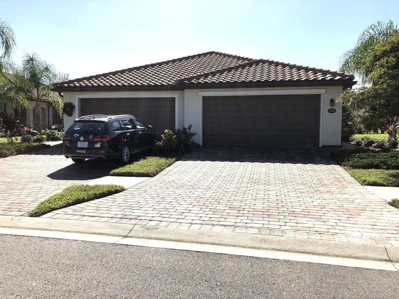 The Villa's tiled roof, garage and driveway
